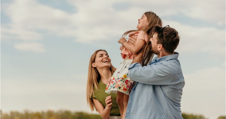 A young family enjoy the outdoors together