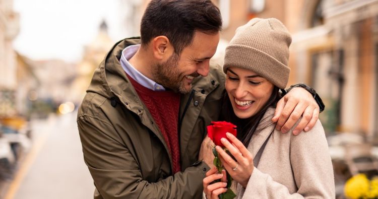 A couple take a romantic walk together for Valentine's Day